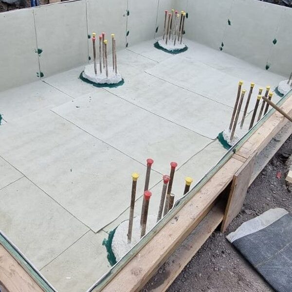 Atal Bentofix 5300 to a lift pit slab with all laps taped using Atal Bentofix tape. Pile c