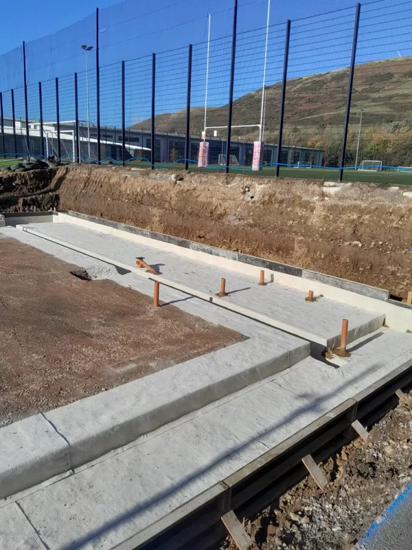 Atal Bentofix 5000 to a slab, sealing pipe penetrations with a fillet of Atal Bentonite Fi