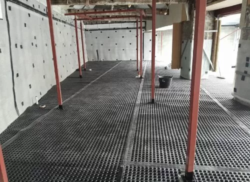 Atal CM20 to floor on a listed building in South Wales.